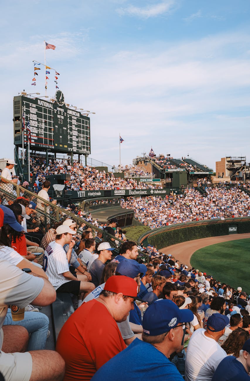 crowd enjoying baseball game at iconic stadium
